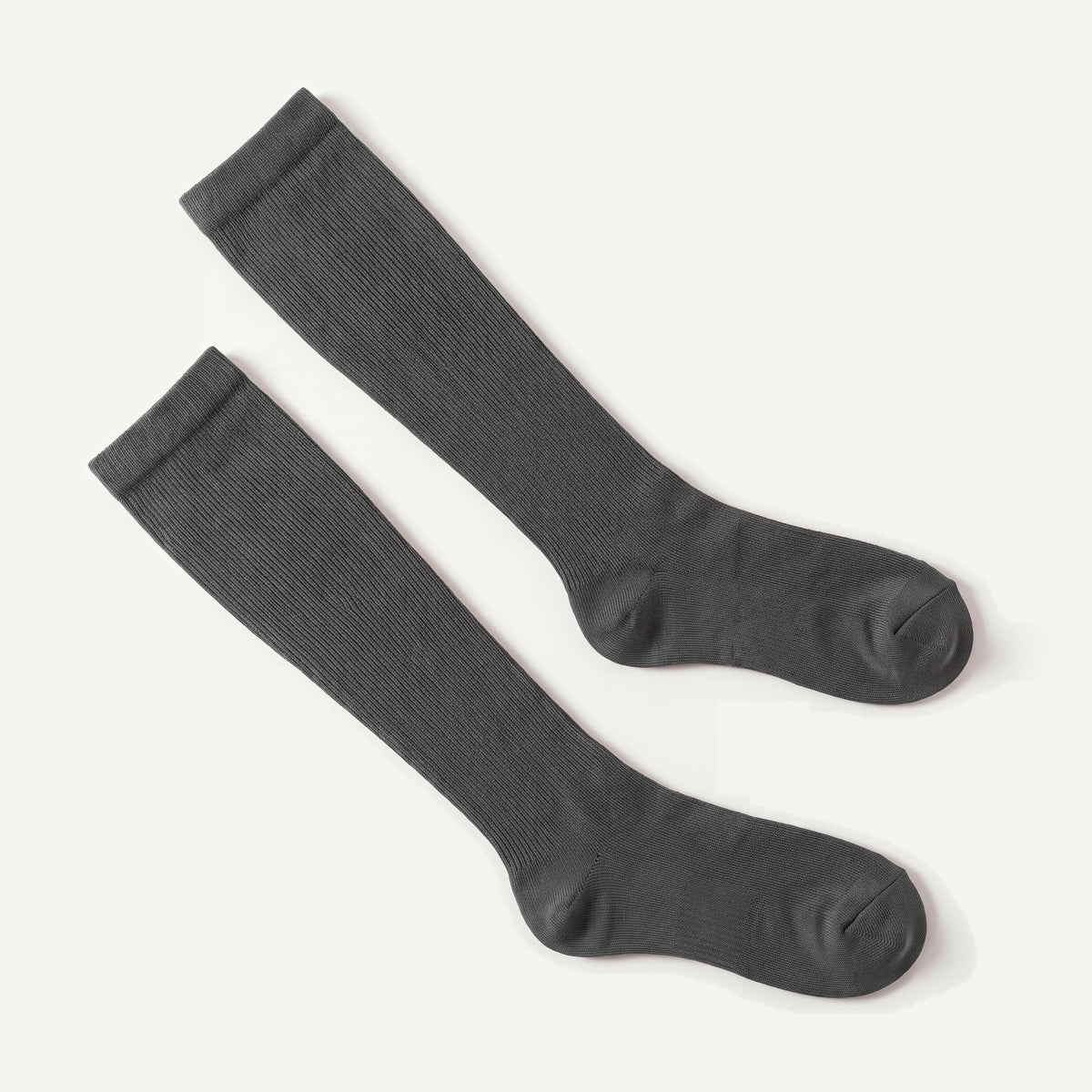 Knee-High Compression Socks in Charcoal Grey, pair laid flat