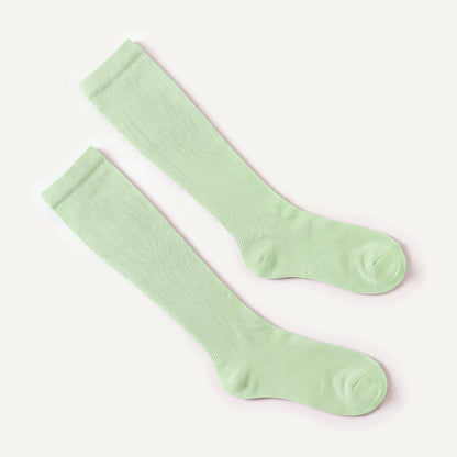 Knee-High Compression Socks in Mint, pair laid flat