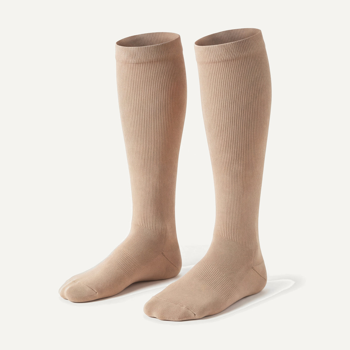 Knee-High Compression Socks in Nude, pair, front three-quarter view