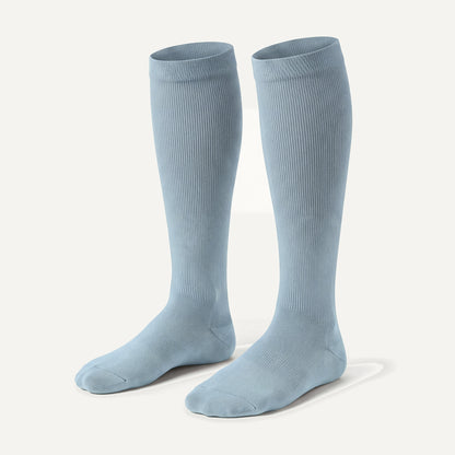 Knee-High Compression Socks in Powder Blue, pair, front three-quarter view